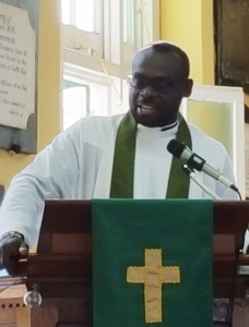 Father Tony delivering the sermon at the 6:30 a.m. Eucharist at St. John's Cathedral, Belize City.