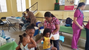 Dr. Patricia Rowe-King examining a child at the Pediatric Clinic.