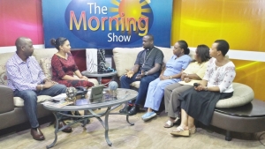Armin Arana and Tarun Butcher interview Father Tony, Dr. Arlene Richards, Dr. Patricia Rowe-King, and Erna Cunningham at Love FM TV Belize.